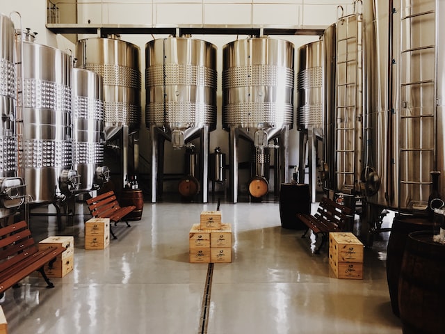 Walls lined with brewing constructions to represent the brewing industry